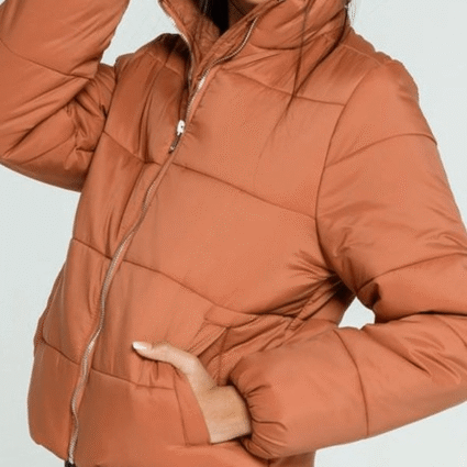 Gianna Mackey Chicago Fire Season 9 Adriyan Rae Orange Puffer Jacket