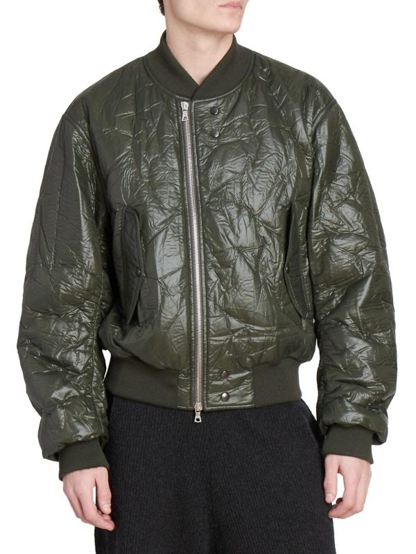 With the creative director's reexamination of classic menswear shapes and textures, this bomber jacket embodies the idea through its unique padded crinkle-shell fabrication.