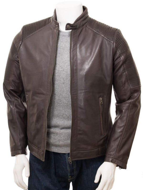 A stunning brown leather biker jacket with an innovative articulated shoulder section. The classic, cafe racer biker jacket just gets better and better. This style has all hallmarks of the original with a YKK zip leading up to a short, padded, tab collar fastened with a press stud. However this piece features a ruched rib section stitched in such a way that the ridges stretch and contract with the movement of the arm. I makes the jacket much less restrictive and easier to move around in than the traditional inset sleeve.