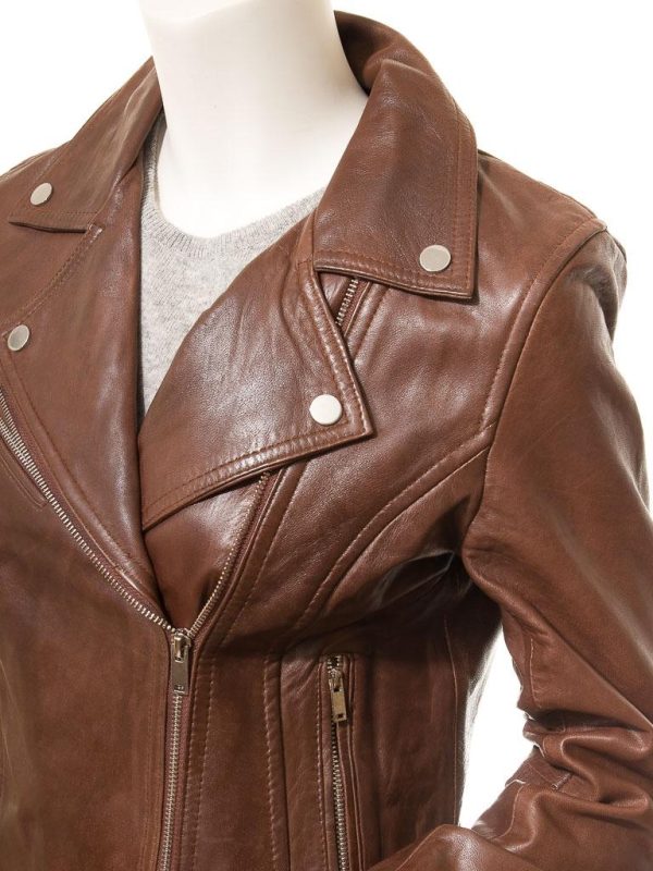 The classic cross zip leather biker jacket in brown. Crafted from an ultra soft and supple sheep nappa leather, this jacket is a cultural icon. An angled polished zip front extends up to a generous notched lapel collar. There is an angled zip pocket on the chest plus two more larger zipped pockets at the waist. The sleeve cuffs are in a zipped gauntlet style to allow a pair of gloves to be comfortably worn underneath. Inside, the jacket is fully satin lined.